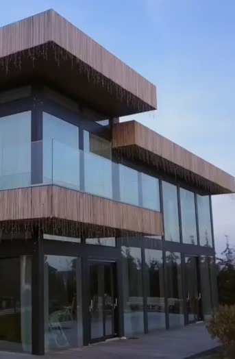 Slat facade and a terrace made of thermo birch, a completed project