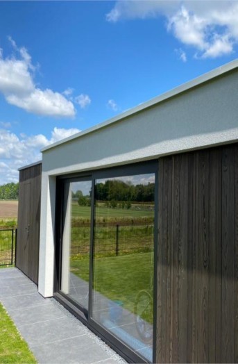 Thermo ash cladding for a modern house